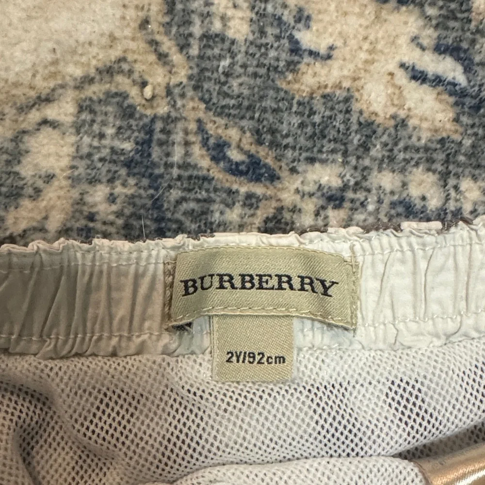 Burberry White Plaid Cargo Shorts with Gray and Red Accents